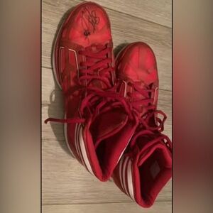 Adizero Adidas shoe, signed by the previous owner. Size 12 for men.